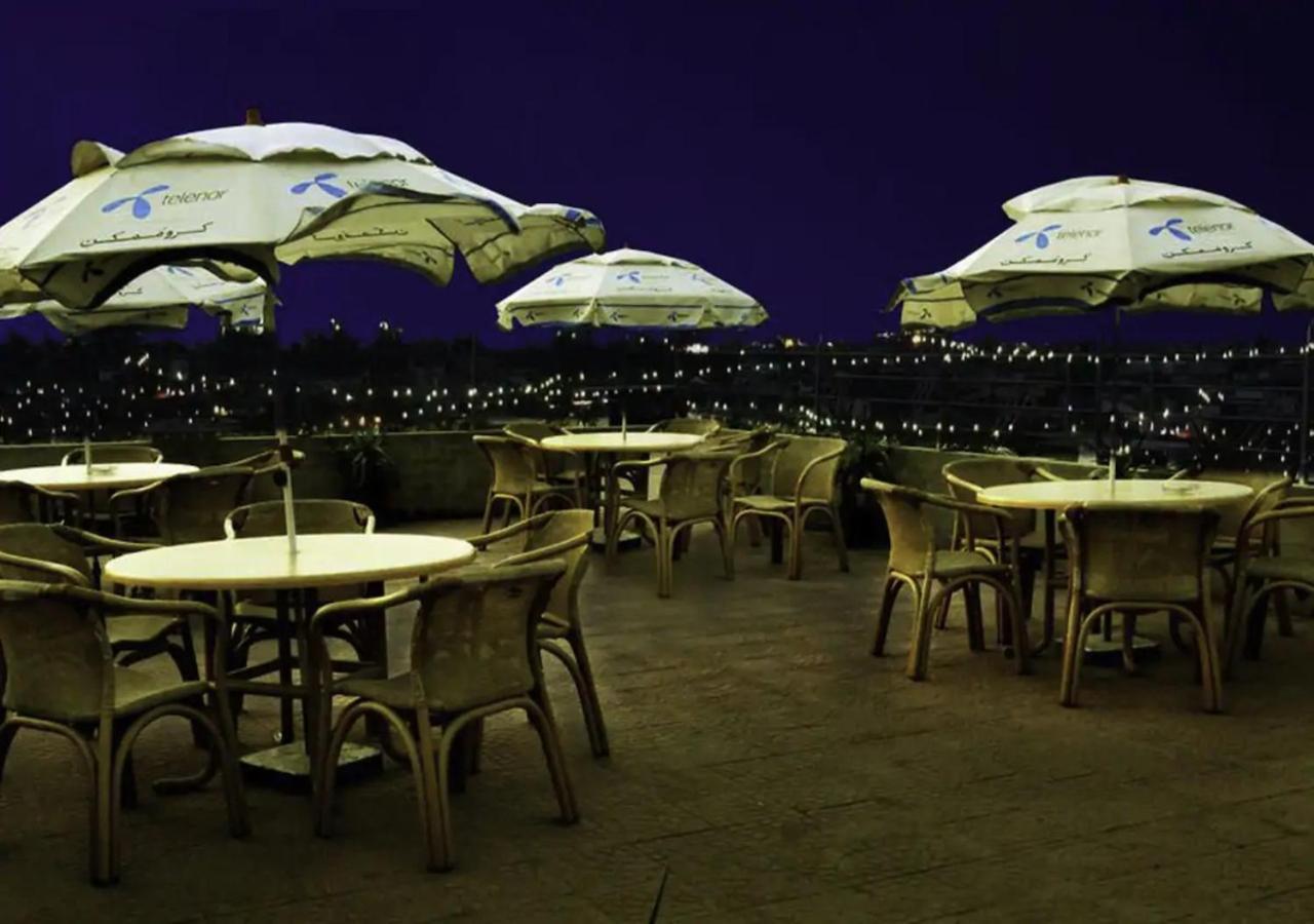 Rajone Hotel Faisalabad Bagian luar foto