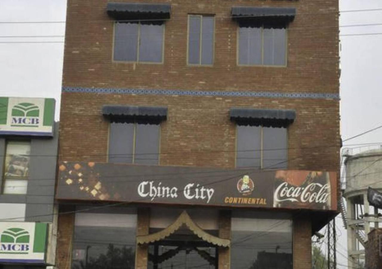 Rajone Hotel Faisalabad Bagian luar foto